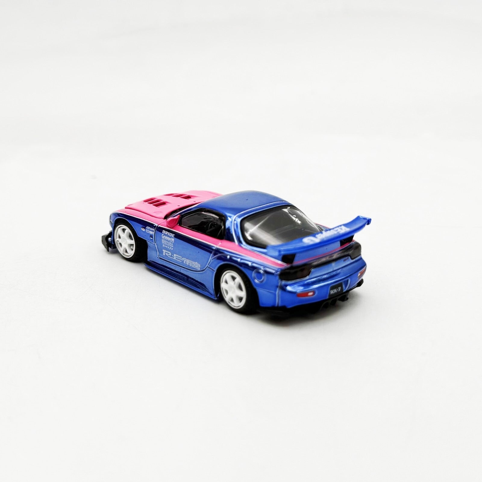 Pop Race 1:64 Mazda RX7 Re Amemiya Wide Body Chrome Blue