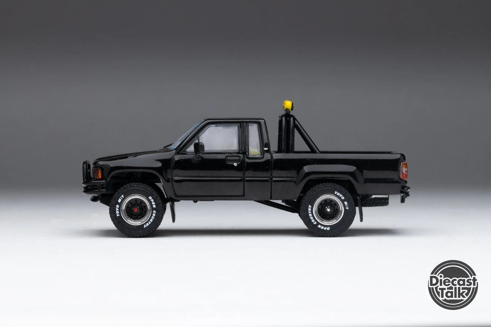 GCD 1:64 Toyota 1985 Hilux SR5 Xtracab Black DiecastTalk Exclusive